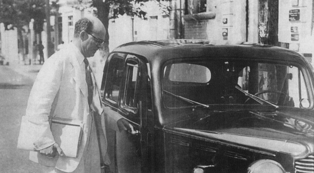 Noel 'Crab' Nethersole about to enter his vehicle in 1954